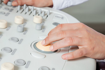 Image showing Female Radiologist Operating Ultrasound Machine