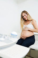 Image showing Pregnant Woman Sitting By Ultrasound Machine