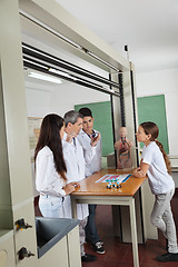 Image showing Teacher Experimenting