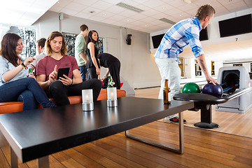 Image showing Friends Having Leisure Time in Bowling Club