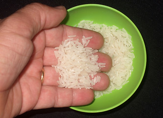 Image showing handful of rice grains