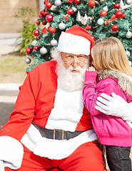 Image showing Girl Telling Wish In Santa Claus's Ear
