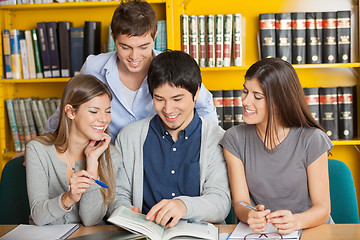 Image showing University Students Studying Together In Library