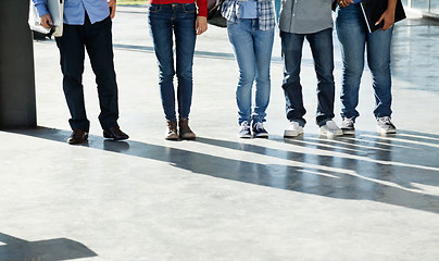 Image showing College Students Standing In A Row On University Campus