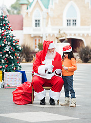 Image showing Girl And Santa Claus With Wish Letter