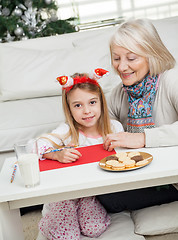 Image showing Girl Making Christmas Greeting Card