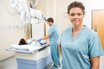 Image showing Medical Team With Patient In Examination Room