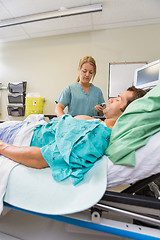 Image showing Nurse with Patient in Emergency