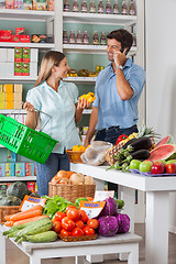 Image showing Couple Shopping Vegetables In Supermarket