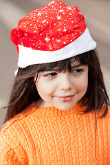 Image showing Girl In Santa Hat Looking Away