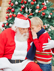 Image showing Boy Telling Wish In Santa Claus's Ear