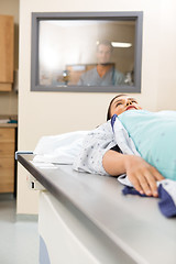 Image showing Patient Getting Xray In Examination Room