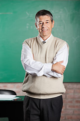 Image showing Professor Standing Arms Crossed In Classroom