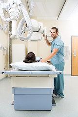 Image showing Nurse Adjusting Xray Machine For Patient