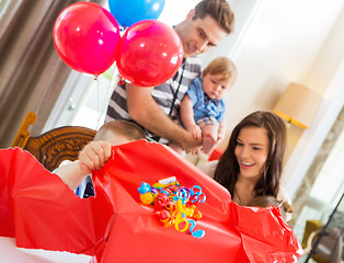 Image showing Birthday Boy Opening Gift Box