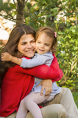 Image showing Mother and daughter hugging