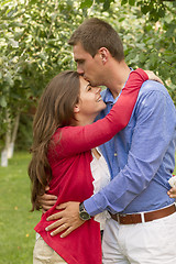 Image showing Beautiful couple enjoying in the beautiful autumn day. 