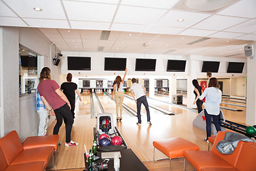 Image showing Young Friends Bowling in Club