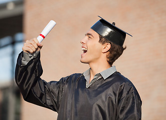 Image showing Student Holding Diploma On Graduation Day In College