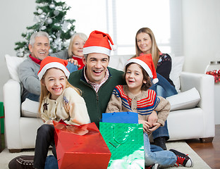 Image showing Happy Family With Gifts During Christmas