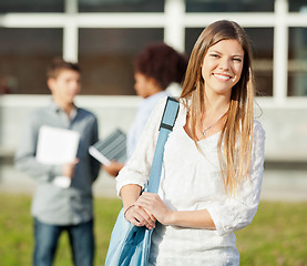 Image showing Happy Student Carrying Shoulder Bag Standing On College Campus