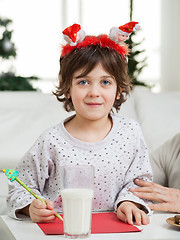 Image showing Cute Boy Making Christmas Greeting Card