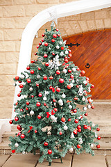 Image showing Christmas Tree In Front Of House