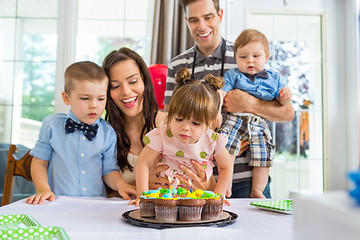 Image showing Family Celebrating Girl's Birthday