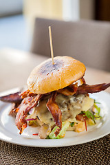 Image showing Bacon Burger on Plate in Restaurant