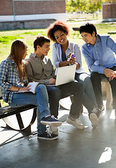 Image showing Student Showing Mobilephone To Friends In Campus