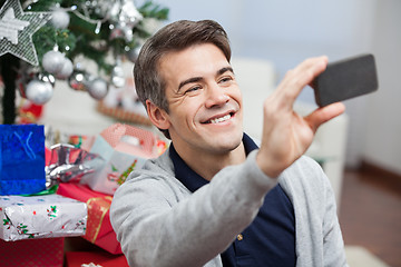 Image showing Man Taking Self Portrait Through Smartphone