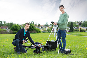 Image showing Technicians Working On UAV Helicopter