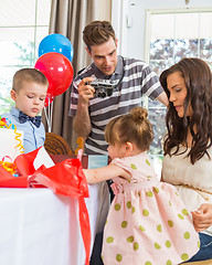 Image showing Family Celebrating Girl's Birthday