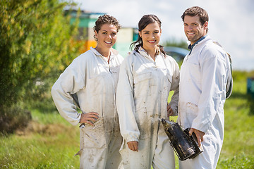 Image showing Beekeepers Standing At Apiary