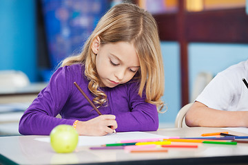 Image showing Girl With Sketch Pen Drawing In Kindergarten