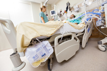 Image showing Urine Bag Attached To Bed