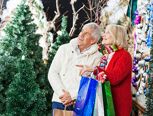 Image showing Couple Shopping At Christmas Store