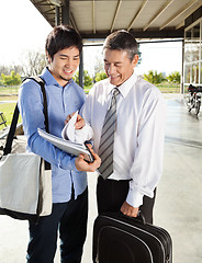 Image showing Professor Explaining Lesson To Student On University Campus