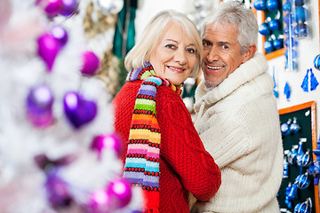 Image showing Happy Senior Couple At Christmas Store