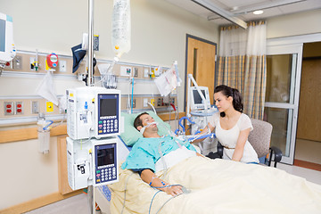 Image showing Worried Woman Looking At Critical Patient