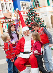 Image showing Santa Claus And Children In Courtyard