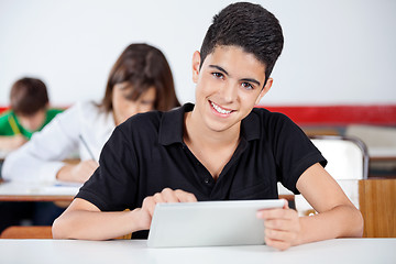 Image showing Portrait Of Teenage Schoolboy Using Digital Tablet