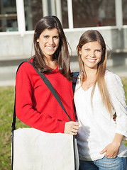 Image showing Beautiful Friends Smiling Together On University Campus