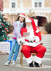Image showing Girl With Santa Claus Using Digital Tablet