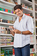 Image showing Male Customer With Digital Tablet In Store