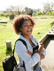 Image showing Cheerful Woman Standing Hands Folded On Campus