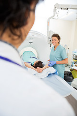 Image showing Nurse Preparing Patient For CT Scan