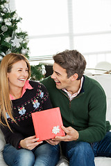 Image showing Happy Couple With Christmas Gift