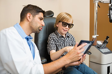 Image showing Young Boy Taking Stereoacuity Test