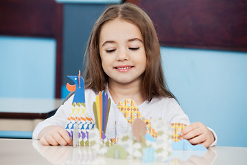 Image showing Girl Making Craft In Preschool